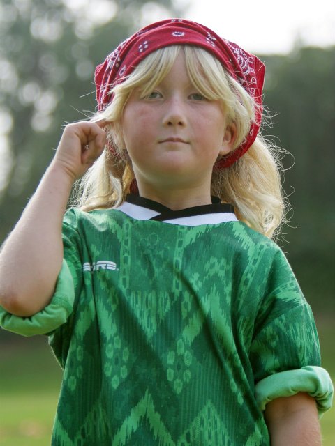 Sara with goalie jersey and red scarf