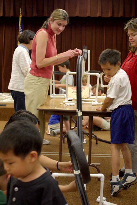 Mrs. Vanek, Matthew, and Arnoldo's mom test their coaster