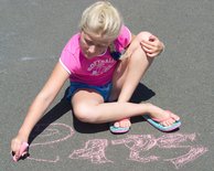 Sara drawing her name
