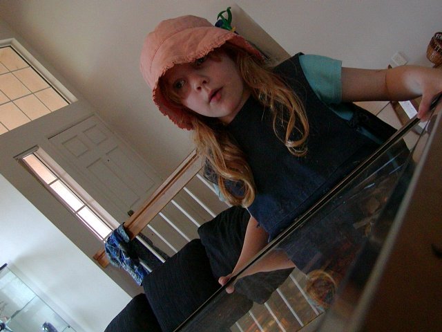 Charlotte playing pinball, II