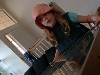 Charlotte playing pinball, II