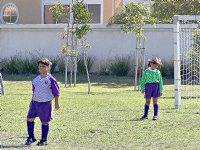 Vanessa and Kelsey defend the goal