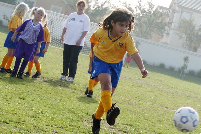 Sara watches a Lightning Bolt kick