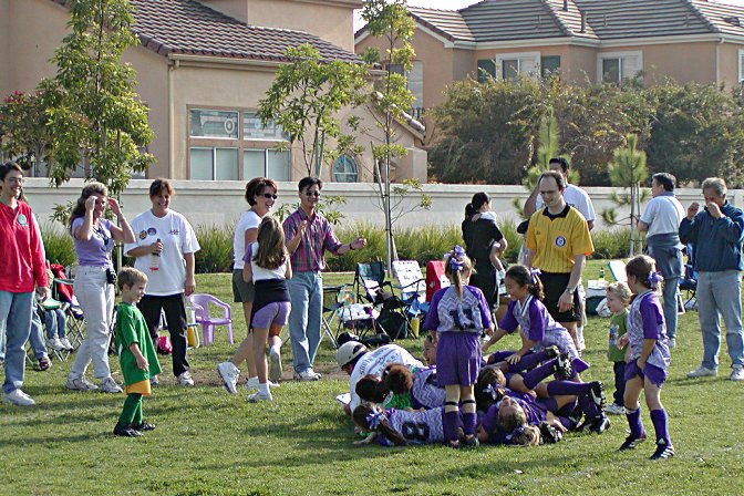 Dogpile on coach Brian