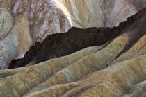 Dark rock outcrop, Zabriskie Point