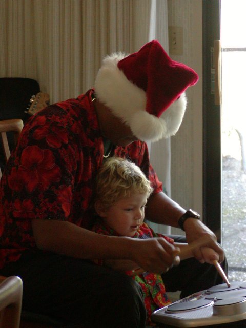 Chaz shows Timothy how to drum