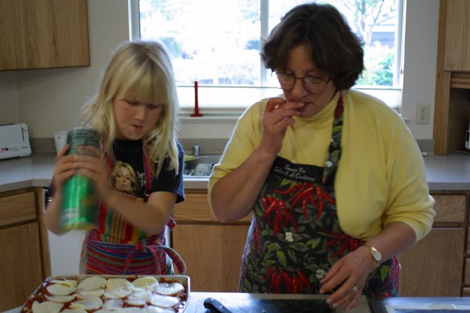 Sara and Phyllis make dinner