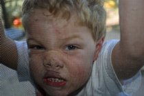 Timothy at the screen door