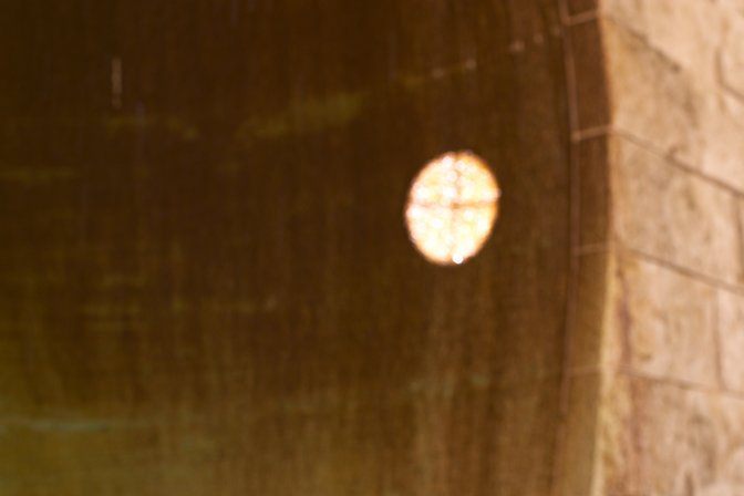 Water and light through the same hole