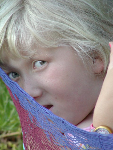 Sara mugs for the camera, III