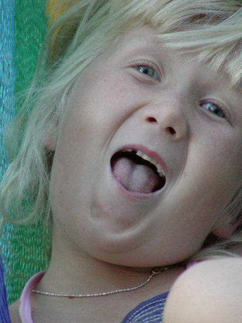 Sara mugs for the camera, IV