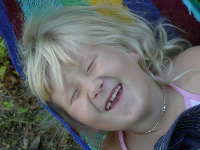 Sara mugs for the camera, VIII