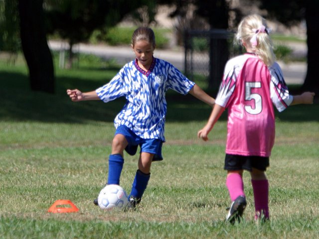 Sara defends against the 2nd quarter kickoff