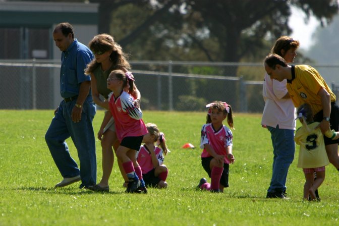 Natalie being helped off the field