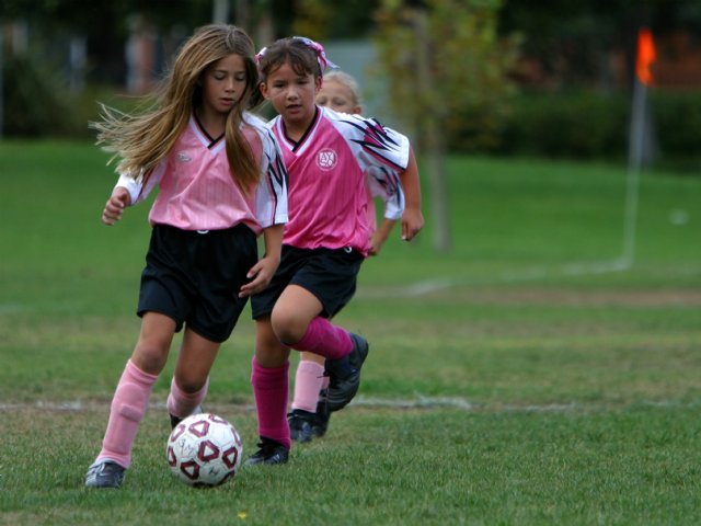 Kelsey between two panthers