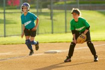 Brittany mans 3rd base while an Ice Breaker takes a lead