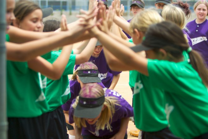 The Hot Shots cheer the returning winners