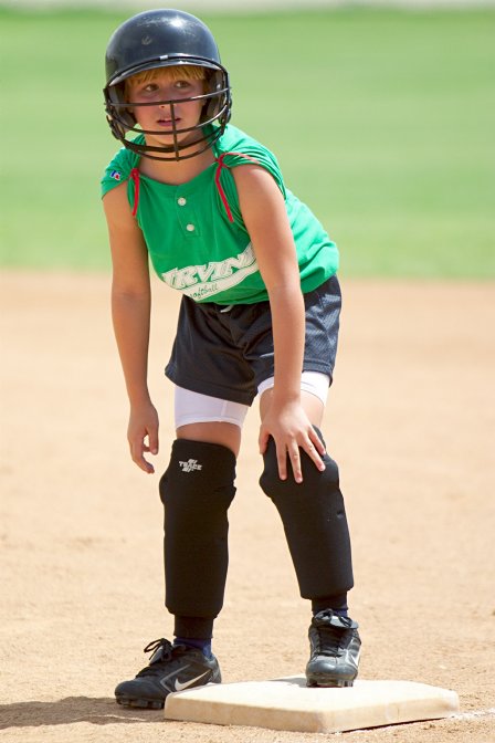 Jennifer holds her sore knee