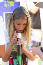 Sophie Playing Didgeridoo