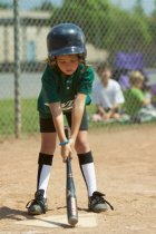 Darya measures her distance from the plate