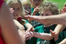 All hands in for a team cheer