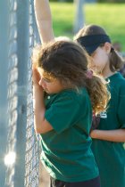 Suraiya and Sophia watch from the dugout