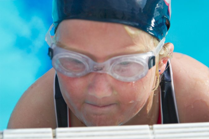 Sara climbing out after her race