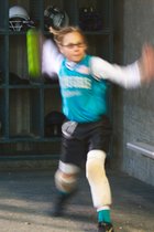 Taylor pretending to pitch in the dugout