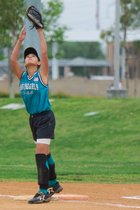 Shannon stretches to make a play at 1st