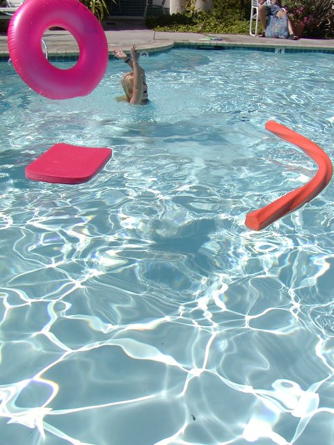 Sara with pool toys