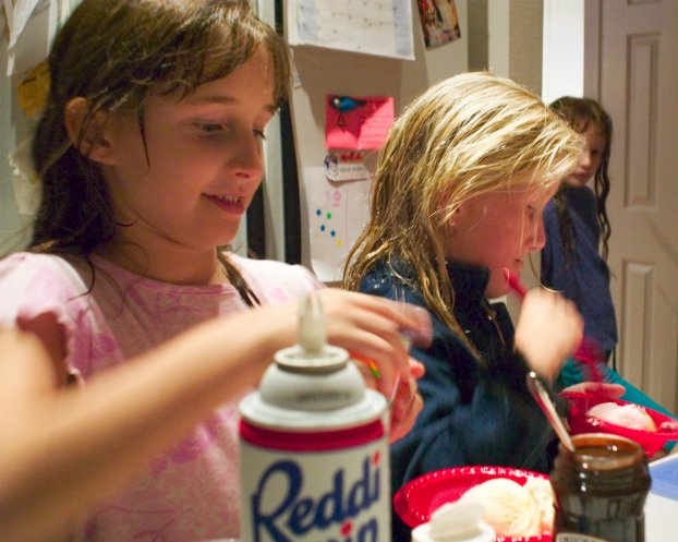 Caitlin and Sara make sundaes