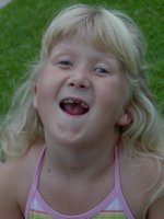 Sara shows off another missing tooth