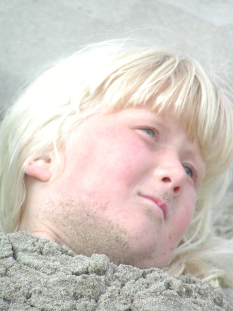 Sara, buried in sand