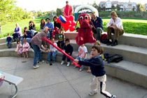 Marco swings at the piñata