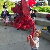 Timothy takes the first hits on the piñata