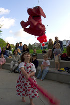 Zena takes her turn under the piñata