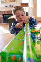 Timothy opening his presents