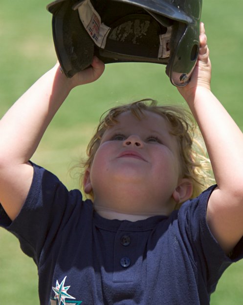 Michela putting her helmet on