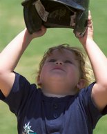 Michela putting her helmet on