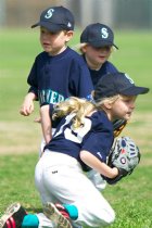 Kiley, Timothy, and Michela going after the ball