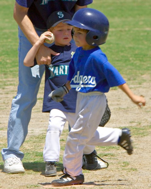 Held back from tagging the runner