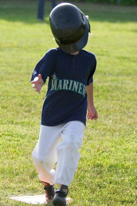 Alana has a helmet problem as she comes into second
