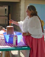 Anna churns butter