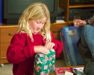 Sara opens a present