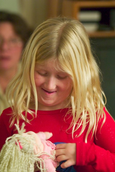 Sara with a new doll