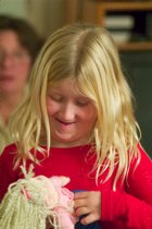 Sara with a new doll