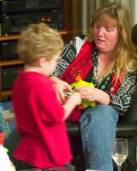 Timothy gets some help with his new piggy bank