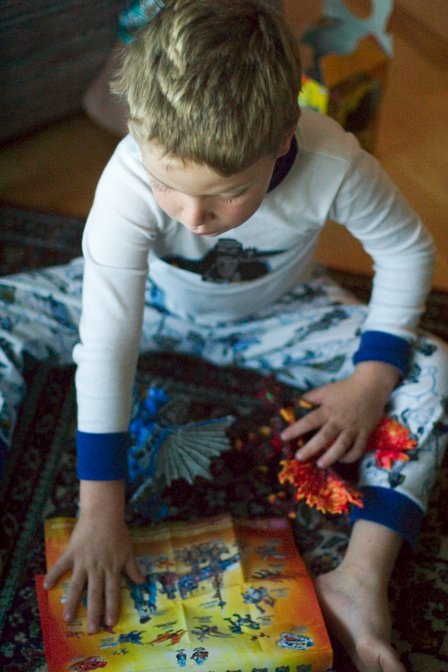 Timothy reads about his dragons