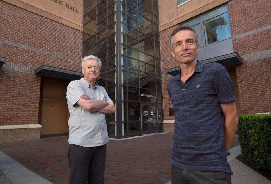 Padhraic Smyth (left) and Mark Steyvers stand outside of Donald Bren Hall. (Steve Zylius/UCI)