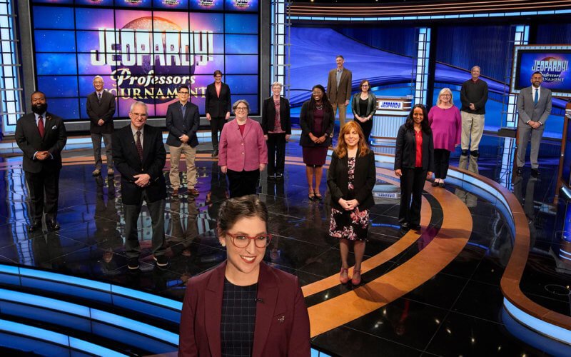 “Jeopardy!” host Mayim Bialik (front) with contestants on the first Professors Tournament, including J.P. Allen (middle, back row).